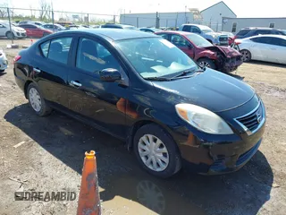 2012 Nissan Versa SV with VIN 3N1CN7AP0CL834668, listed as a IAAI auction lot 42032785 with 161,048 mi miles. Bid and sale history available at carsss.com. Image 1.