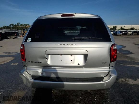 2005 Dodge Caravan SXT with VIN 1D4GP45R95B419486, listed as a Copart auction lot 60313045 with 180,615 mi miles and Salvage title. Bid and sale history available at DreamBid. Image 6.