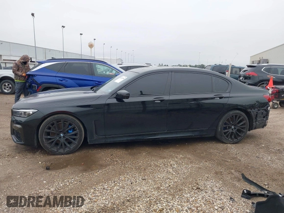 2021 BMW 7 Series 740i z VIN WBA7T2C06MCE57381, wystawiony jako IAAI lot #41620500 z przebiegiem 58 326 mil mil oraz . Historia ofert i sprzedaży dostępna na DreamBid. Obrazek 14.