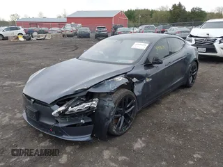 2021 Tesla Model S Long Range with VIN 5YJSA1E5XMF428519, listed as a IAAI auction lot 41926242 with 54,284 mi miles and . Bid and sale history available at DreamBid. Image 19.