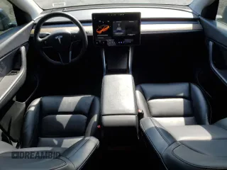 2021 Tesla Model Y Long Range with VIN 5YJYGDEE9MF119974, listed as a Copart auction lot 53794025 with 66,411 mi miles and Salvage Title. Bid and sale history available at DreamBid. Image 8.