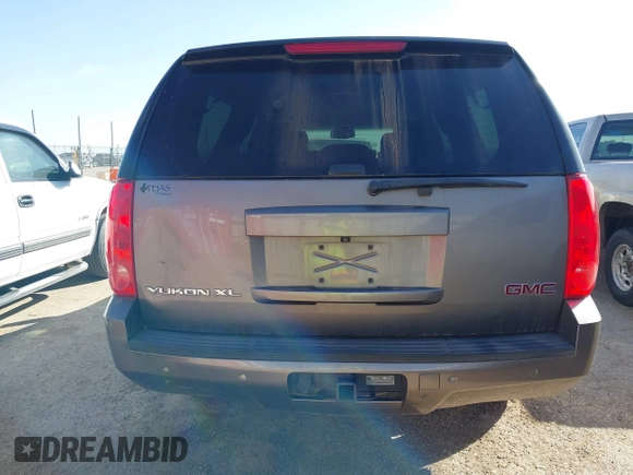 2013 GMC Yukon XL SLT z VIN 1GKS2KE70DR303872, wystawiony jako IAAI lot #41659911 z przebiegiem 199 202 mil mil oraz . Historia ofert i sprzedaży dostępna na DreamBid. Obrazek 16.
