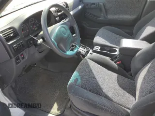 2001 Isuzu Rodeo S with VIN 4S2DM58W114343183, listed as a Copart auction lot 88128465 with 85,926 mi miles and Salvage Title. Bid and sale history available at DreamBid. Image 7.