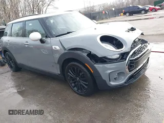 2017 MINI Clubman Cooper S with VIN WMWLU5C59H2E83705, listed as a IAAI auction lot 41853702 with 135,905 mi miles. Bid and sale history available at carsss.com. Image 1.