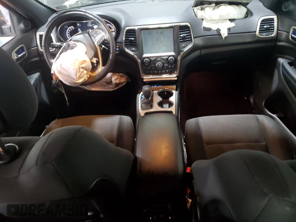 2017 Jeep Grand Cherokee Laredo with VIN 1C4RJFAG4HC959253, listed as a Copart auction lot 57045355 with 64,511 mi miles and Salvage title. Bid and sale history available at DreamBid. Image 8.
