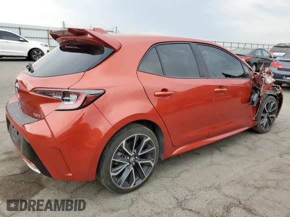 2019 Toyota Corolla Hatchback SE with VIN JTNK4RBE9K3028919, listed as a Copart auction lot 65791694 with 83,981 mi miles and Salvage Title. Bid and sale history available at carsss.com. Image 3.
