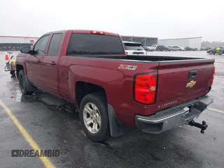 2014 Chevrolet Silverado 1500 LT with VIN 1GCVKRECXEZ296266, listed as a IAAI auction lot 41606586 with 233,832 mi miles and . Bid and sale history available at DreamBid. Image 3.