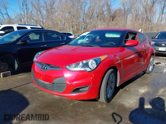 2016 Hyundai Veloster z VIN KMHTC6AD1GU260219, wystawiony jako IAAI lot #41114806 z przebiegiem 128 000 mil mil oraz . Historia ofert i sprzedaży dostępna na DreamBid. Obrazek 18.