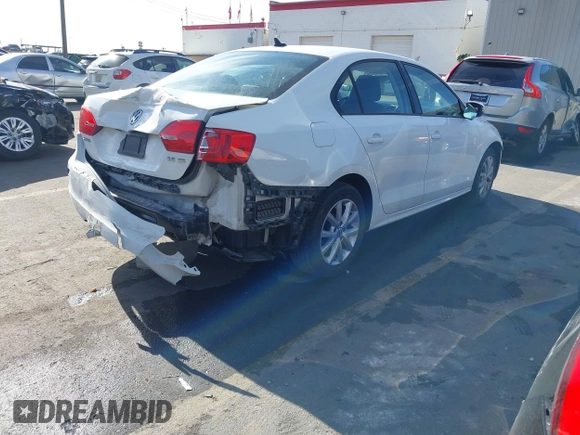 2012 Volkswagen Jetta Sedan SE w/Convenience with VIN 3VWDX7AJ7CM377081, listed as a IAAI auction lot 40756653 with 120,019 mi miles. Bid and sale history available at carsss.com. Image 4.
