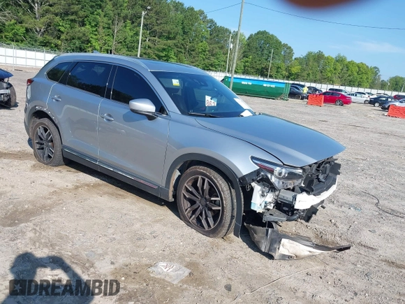 2016 Mazda CX-9 Signature with VIN JM3TCBEY7G0120023, listed as a IAAI auction lot 42431039 with 160,276 mi miles and . Bid and sale history available at DreamBid. Image 1.