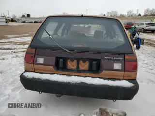 1989 Toyota Camry z VIN JT2SV21W5K0240987, wystawiony jako Copart lot #42248385 z przebiegiem 246 651 mil mil oraz Czysty tytuł • Clean title. Historia ofert i sprzedaży dostępna na DreamBid. Obrazek 6.