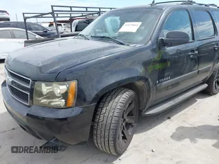 2007 Chevrolet Tahoe LT with VIN 1GNFC13087R188069, listed as a IAAI auction lot 42473664 with 195,237 mi miles and . Bid and sale history available at DreamBid. Image 2.