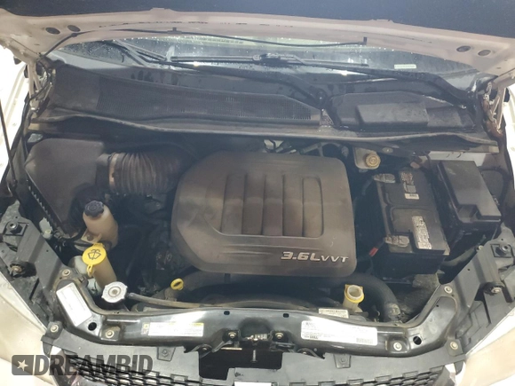 2012 Dodge Grand Caravan SE with VIN 2C4RDGBG3CR341742, listed as a Copart auction lot 50688645 with 136,530 mi miles and Clean Title. Bid and sale history available at DreamBid. Image 12.