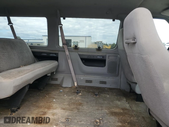 1998 Ford Econoline Wagon XL z VIN 1FBSS31L0WHC02316, wystawiony jako Copart lot #76501784 z przebiegiem 235 832 mil mil oraz Szkoda całkowita • Salvage title. Historia ofert i sprzedaży dostępna na DreamBid. Obrazek 11.