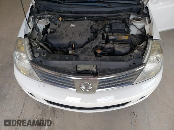 2009 Nissan Versa 1.8 S with VIN 3N1BC13E09L496658, listed as a Copart auction lot 67597234 with 125,854 mi miles and Salvage Title. Bid and sale history available at carsss.com. Image 12.