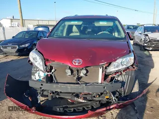 2014 Toyota Sienna XLE with VIN 5TDYK3DCXES473671, listed as a IAAI auction lot 42243030 with 70,052 mi miles and . Bid and sale history available at DreamBid. Image 12.
