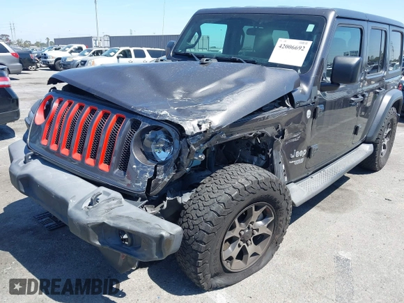 2020 Jeep Wrangler Unlimited Freedom z VIN 1C4HJXDG8LW338702, wystawiony jako IAAI lot #42006692 z przebiegiem 48 389 mil mil oraz . Historia ofert i sprzedaży dostępna na DreamBid. Obrazek 6.