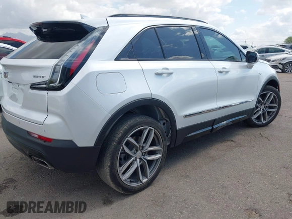 2022 Cadillac XT4 FWD Sport with VIN 1GYFZER44NF164899, listed as a IAAI auction lot 42152554 with 8,058 mi miles and . Bid and sale history available at DreamBid. Image 4.