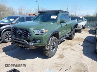 2021 Toyota Tacoma 4WD SR with VIN 3TMCZ5ANXMM382874, listed as a IAAI auction lot 41965388 with 62,178 mi miles. Bid and sale history available at carsss.com. Image 18.