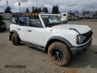 2023 Ford Bronco with VIN 1FMEE5BP0PLB59328, listed as a Copart auction lot 47301845 with 24,699 mi miles and Salvage Title. Bid and sale history available at carsss.com. Image 4.