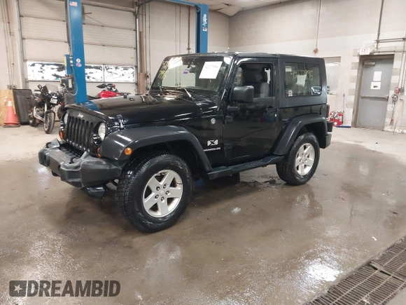 2007 Jeep Wrangler X with VIN 1J4FA24187L117446, listed as a IAAI auction lot 42177996 with 218,976 mi miles and . Bid and sale history available at DreamBid. Image 2.