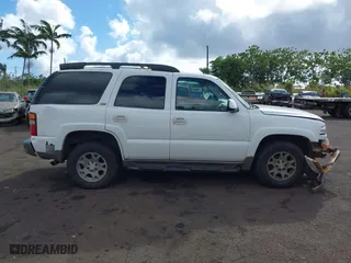 2003 Chevrolet Tahoe Z71 with VIN 1GNEK13T53R109296, listed as a IAAI auction lot 41659341 with 223,479 mi miles. Bid and sale history available at carsss.com. Image 13.