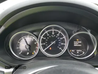 2021 Mazda CX-5 Touring with VIN JM3KFACM8M0406987, listed as a Copart auction lot 45241535 with 57,673 mi miles and Salvage Title. Bid and sale history available at carsss.com. Image 9.