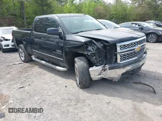 2014 Chevrolet Silverado 1500 LT with VIN 1GCRCREH3EZ138815, listed as a IAAI auction lot 41883354 with 214,630 mi miles. Bid and sale history available at carsss.com. Image 1.