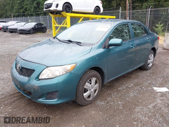 2010 Toyota Corolla with VIN 1NXBU4EE3AZ165944, listed as a IAAI auction lot 42597459 with 211,824 mi miles and . Bid and sale history available at DreamBid. Image 17.