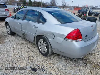 2013 Chevrolet Impala LT with VIN 2G1WG5E36D1235835, listed as a IAAI auction lot 41866890 with 121,742 mi miles and . Bid and sale history available at DreamBid. Image 3.
