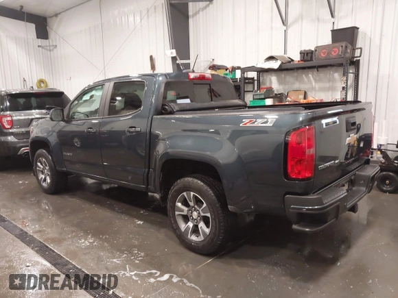 2020 Chevrolet Colorado 4WD Z71 with VIN 1GCGTDEN1L1163546, listed as a IAAI auction lot 41706719 with 64,662 mi miles and . Bid and sale history available at DreamBid. Image 3.