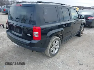 2013 Jeep Patriot Latitude with VIN 1C4NJPFB2DD233848, listed as a IAAI auction lot 41711832 with Not Provided miles. Bid and sale history available at carsss.com. Image 4.