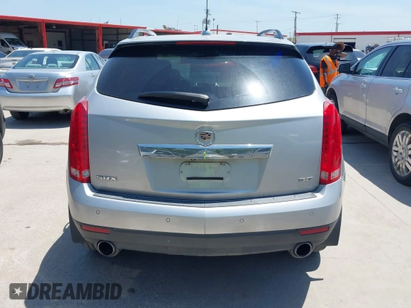 2015 Cadillac SRX Luxury Collection z VIN 3GYFNBE35FS627640, wystawiony jako IAAI lot #42262843 z przebiegiem 211 669 mil mil oraz . Historia ofert i sprzedaży dostępna na DreamBid. Obrazek 16.