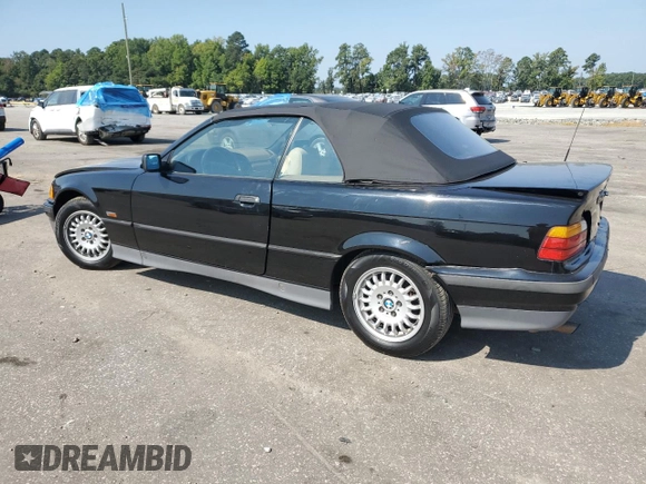 1995 BMW 3 Series 318iC with VIN WBABK5321SEC84192, listed as a Copart auction lot 69299564 with 199,105 mi miles and Salvage Title. Bid and sale history available at carsss.com. Image 2.