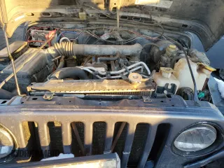 2001 Jeep Wrangler Sport with VIN 1J4FA49S71P360257, listed as a Copart auction lot 87748705 with 160,702 mi miles and Salvage Title. Bid and sale history available at carsss.com. Image 11.