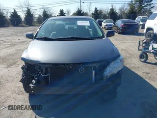 2011 Toyota Corolla L with VIN 2T1BU4EE1BC674644, listed as a IAAI auction lot 41876165 with 128,830 mi miles. Bid and sale history available at carsss.com. Image 12.