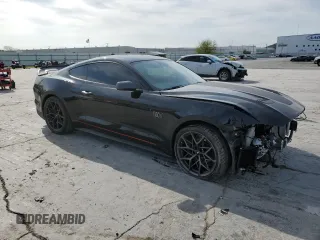 2021 Ford Mustang Mach 1 with VIN 1FA6P8R04M5552462, listed as a Copart auction lot 50628385 with 19,556 mi miles and Salvage Title. Bid and sale history available at carsss.com. Image 4.