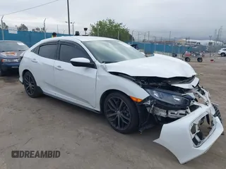 2021 Honda Civic Sport with VIN SHHFK7H42MU419784, listed as a IAAI auction lot 42202495 with 55,958 mi miles and . Bid and sale history available at DreamBid. Image 1.