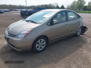 2007 Toyota Prius z VIN JTDKB20U073280948, wystawiony jako IAAI lot #42166258 z przebiegiem 236 628 mil mil oraz . Historia ofert i sprzedaży dostępna na DreamBid. Obrazek 2.
