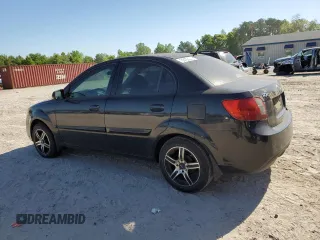2011 Kia Rio LX with VIN KNADH4A31B6749736, listed as a Copart auction lot 53128685 with 103,392 mi miles and Clean Title. Bid and sale history available at carsss.com. Image 2.
