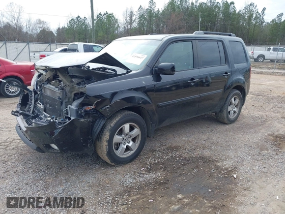 2011 Honda Pilot EX-L with VIN 5FNYF3H6XBB030039, listed as a IAAI auction lot 41596617 with 116,961 mi miles and . Bid and sale history available at DreamBid. Image 20.