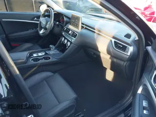 2020 Genesis G70 2.0T with VIN KMTG64LA1LU056066, listed as a IAAI auction lot 41139287 with 23,727 mi miles and . Bid and sale history available at DreamBid. Image 5.