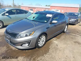 2015 Kia Optima EX with VIN 5XXGN4A71FG411269, listed as a IAAI auction lot 41856582 with 122,581 mi miles. Bid and sale history available at carsss.com. Image 2.