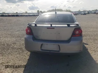 2014 Dodge Avenger SE z VIN 1C3CDZAB9EN126846, wystawiony jako Copart lot #54504155 z przebiegiem 144 352 mil mil oraz Szkoda całkowita • Salvage title. Historia ofert i sprzedaży dostępna na DreamBid. Obrazek 6.