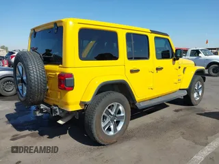 2018 Jeep Wrangler Unlimited Sahara z VIN 1C4HJXEN3JW306282, wystawiony jako IAAI lot #42302821 z przebiegiem 70 204 mil mil oraz . Historia ofert i sprzedaży dostępna na DreamBid. Obrazek 4.
