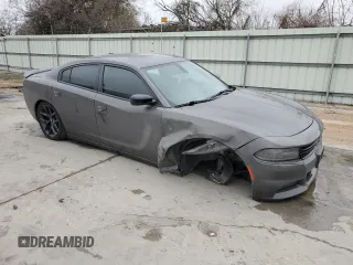 2020 Dodge Charger SXT with VIN 2C3CDXBG1LH114890, listed as a Copart auction lot 42984485 with 63,374 mi miles and Salvage Title. Bid and sale history available at carsss.com. Image 4.