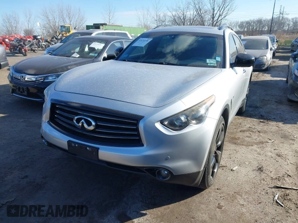 2015 Infiniti QX70 with VIN JN8CS1MW6FM482894, listed as a IAAI auction lot 41671236 with 106,599 mi miles and . Bid and sale history available at DreamBid. Image 2.