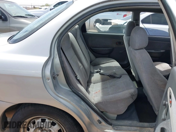 2001 Kia Sephia with VIN KNAFB121815081573, listed as a IAAI auction lot 42058297 with 112,069 mi miles and . Bid and sale history available at DreamBid. Image 8.
