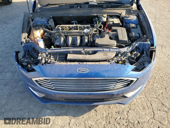 2018 Ford Fusion SE z VIN 3FA6P0H71JR107704, wystawiony jako Copart lot #75017244 z przebiegiem 202 999 mil mil oraz Nie do naprawy • Non repairable. Historia ofert i sprzedaży dostępna na DreamBid. Obrazek 11.