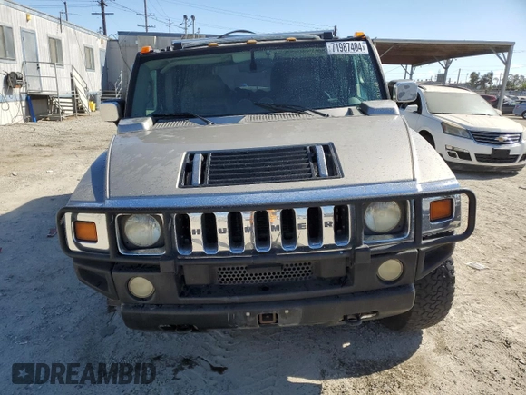 2003 Hummer H2 with VIN 5GRGN23U93H132656, listed as a Copart auction lot 71987404 with 152,287 mi miles and Salvage Title. Bid and sale history available at carsss.com. Image 5.